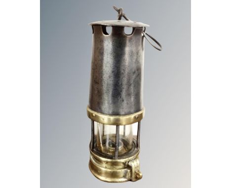 A vintage protector miner's lamp 