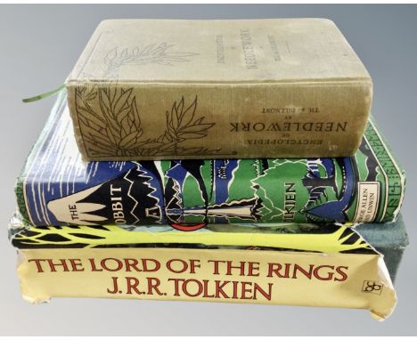 Two 20th century Tolkein volumes - The Lord of the Rings and Hobbit, together with the encyclopedia of needlework 