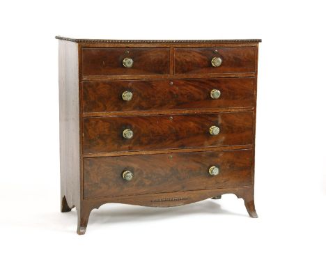 A George IV mahogany chest of two short and three long drawers, on out swept bracket feet, with lacquered brass knobs, 110cm 
