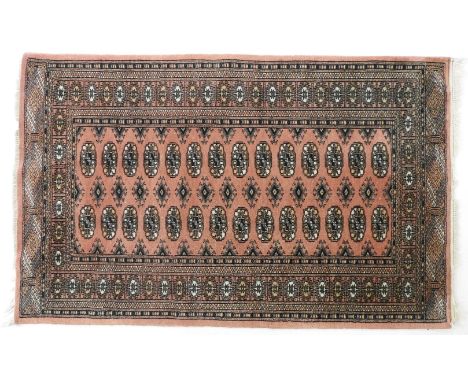 A modern pink ground Persian carpet, 220 x 310cm, and a similar small rug, 156 x 97cm