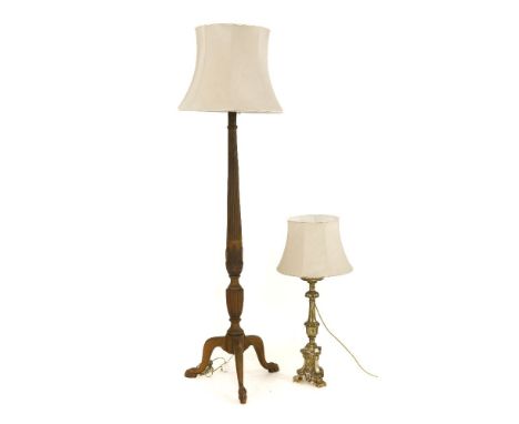 A Georgian style carved standard lamp, with tripod base and claw feet, and a carved gilt wood table lamp, 59cm high (to top o