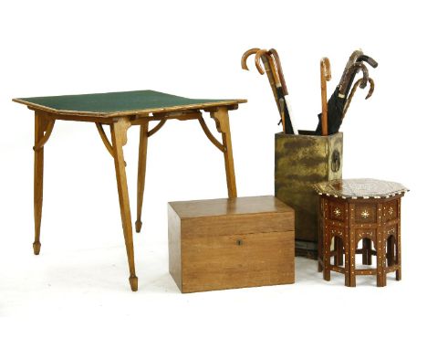 A teak trunk, 46 x 30 x 30cm, an ivory inlaid octagonal folding table, a folding card table and various walking sticks and um