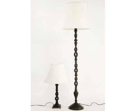 A bronzed metal standard lamp, with open twist support, 140cm tall, together with a small similar table lamp, and a wooden tr