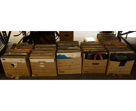 A large collection of records, to include Prince and the Revolution, Carly Simon, Michael Jackson, ZZ Top, Elvis Costello, Si