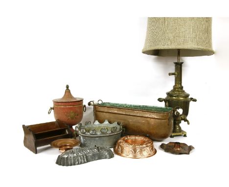 A brass tea urn converted into a lamp together with an Arts and Crafts chamberstick, a copper trough, a faux toleware ice buc