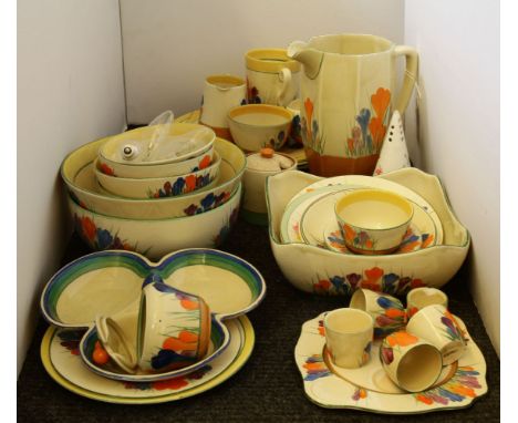 Clarice Cliff 'Crocus' pattern, various tea wares, cups and saucers, a jug, and a bowl