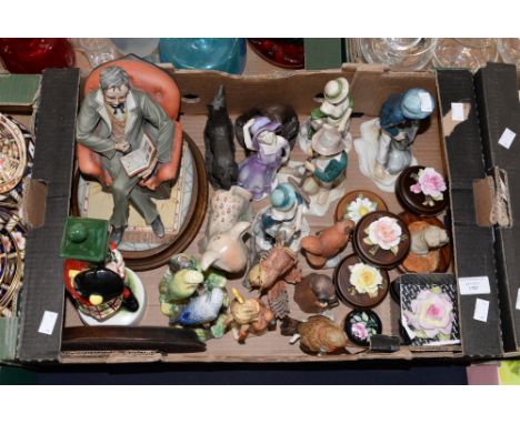 One box containing four Goebel figures, Welsh Crest figurines, china flowers on bases, etc  