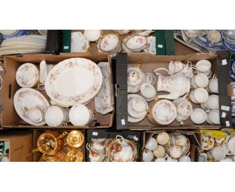 A quantity of Paragon, Victoriana Rose china dinner and tea wares, comprising four dinner plates, seven salad plates, seven s