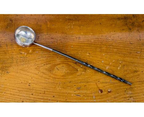 Small silver/silver plated ladle with gold coin to centre