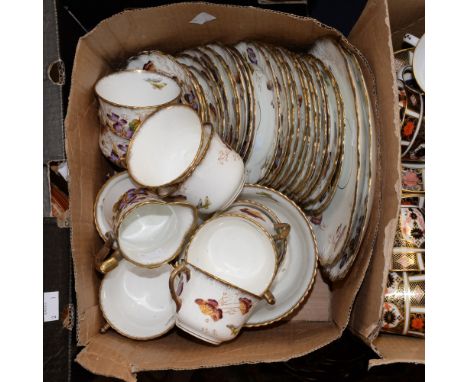 A late 19th Century Staffordshire tea service, setting for twelve, to include plates, cups/saucers, bread plates and milk and