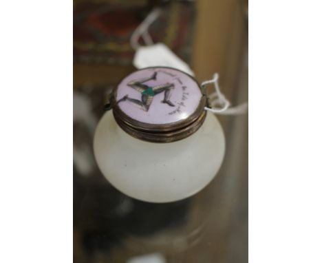 A 'present from the Isle of Man' enamel cap with gilt metal frame and collar, French glass dressing table jar 