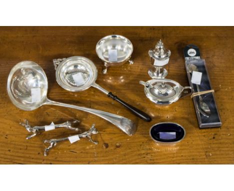 A collection of silver tableware, including a George V 'Old English' pattern soup ladle, Sheffield 1912, an Elizabeth II tea 