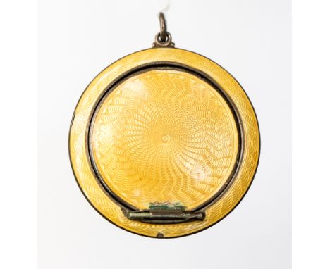 An Asprey and Garrard, enamelled silver compact, round form with yellow guilloche enamel, approx diameter 45mm