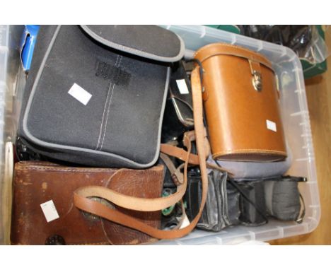 Photographic interest: a collection of cameras and camera equipment to include Kodak Junior (cased) Canon QL, Zenit B, Sigma 