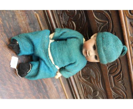 A German bisque head doll with blue, opening/closing eyes and open mouth (1) 