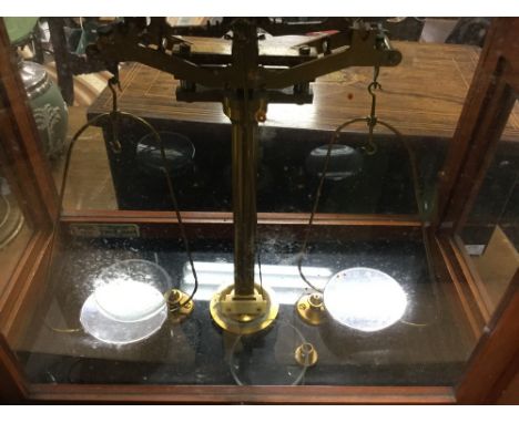 Cased set of pharmaceutical scales by . Oertling Ltd, London, retailed by Standley Belcher & Mason Ltd, Church Street, Birmin