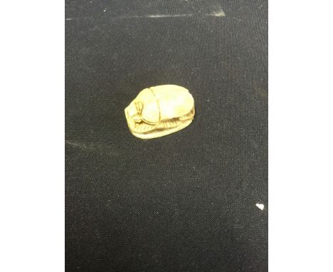 A Japanese stone Netsuke in the form of a beetle (1)