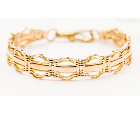 A 9ct gold fancy gate link bracelet, with swivel clasp, total length approx 7'', with a weight of 14.5 grams approx 