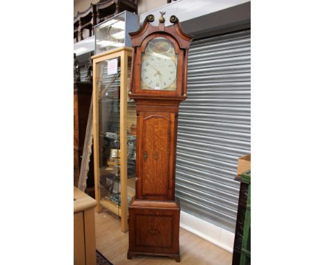 An early 19th Century oak and mahogany cross-banded longcase clock, by J Foxton, Sutton Ashfield, with a white enamelled dial