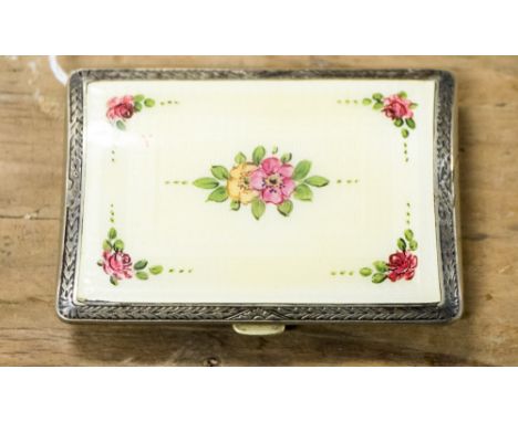 A Guilloche enamel, white metal and gilt ladies cigarette case, circa 20th century. The front of the case decorated with pret