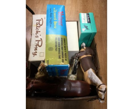 A boxed Action Man Horse with Saddle, a boxed Marx Valour the Armoured Horse, and unboxed rider, a boxed Action Girl Pony Rid