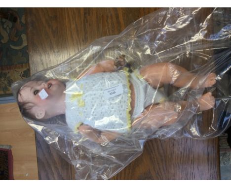 A Henbach Koppelford bisque doll, damage to fingers, registration no. 267.3 stamped also Germany D.R.6.M, in late knitted out