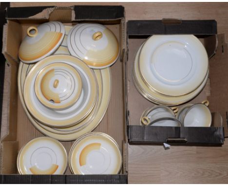 A Shelley Art Deco dinner service, pattern 12248, orange segment and gilt design, including dinner plates, soup bowls, saucer