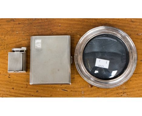 A silver pocket cigarette case, a Roller Beacon pocket lighter and a circular silver photo frame (3) 