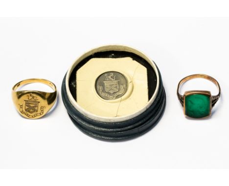 An 18ct yellow gold seal ring bearing a coat of arms for the "Tweedie" family, size N, complete with the seal stamp used to m