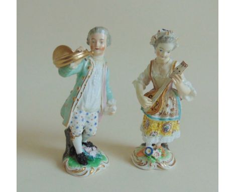 Pair of Derby Musician figures, in the Meissen style.Circa 1785-1825, Mock Dresden mark, blue crossed swords, Size  11cms hig