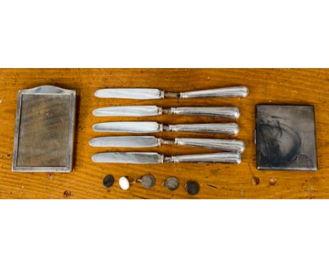 A silver gilt lined cigarette case, weighing approx 3.43 ozt, Birmingham 1931, with a silver picture frame, five silver handl