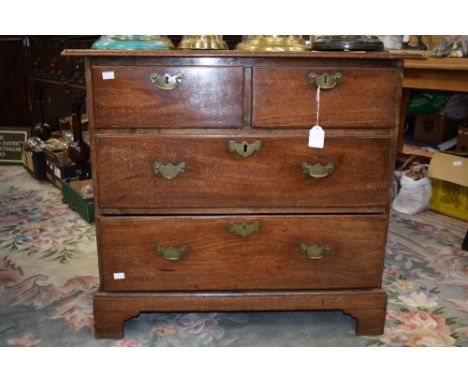  A George III two above two small chest of drawers on bracket feet, brass swing handles, mahogany 
