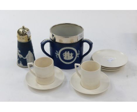 Wedgwood, Keith Murray, two coffee cans, five saucers, Moonstone pattern, with a Jasper ware silver rimmed jug, and a jasper 