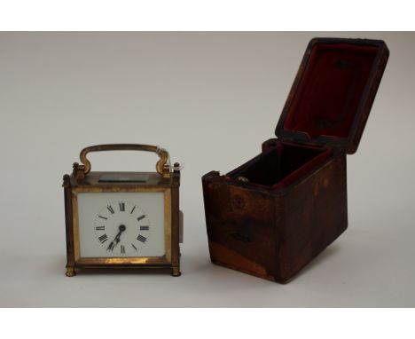 A French brass carriage clock in original case with Roman numerals to dial 
