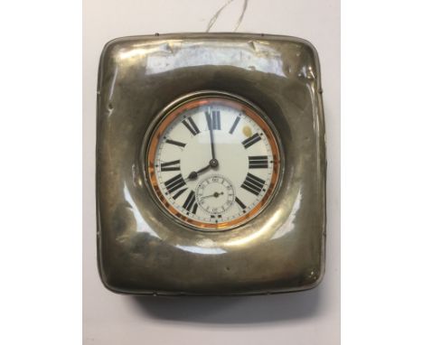 A travelling clock with silver outer case, Chester assayed, markers mark A.B.S, dated mid 1900's  