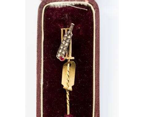 Cricket interest, a yellow metal diamond and ruby cricket bat stick pin , original box