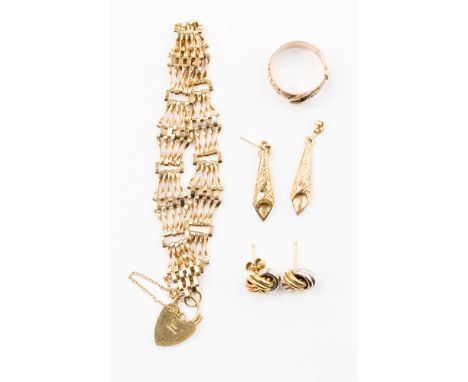 Various items of Gold jewelry. including a 9ct gold gate bracelet, two pairs of yellow metal earrings and a rose metal buckle