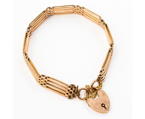 A 9ct rose gold gate link bracelet with padlock clasp, approx 17.6 grams 