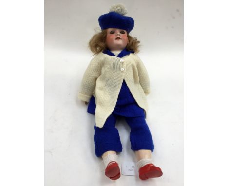 An Armand Marseille bisque head doll, having open & closing eyes,open mouth revealing 4 top teeth, mark to back of neck 'Arma