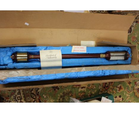 A boxed Heritage collection classical ship's barometer, No. 251/2000, Dove Bazeley Ltd 