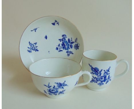 Worcester blue and white trio, decorated with dry blue floral sprays, circa 1780, approx sizes, teacup 5.5cms high 8.2cms dia