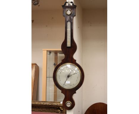A 19th Century wheel barometer and thermometer, circa 1840 