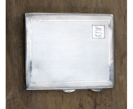 A George V silver cigarette case, engine turned decoration, E J Houlston, Birmingham, 1928: 2.88 ozs (89.6 grams) together wi