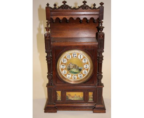 An oak cased bracket clock, with pictorial dial and Arabic numerals, approx 54cms high (1) 