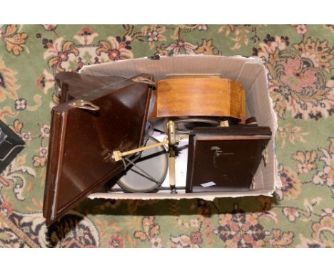 A pair of 'gold weighing' scales, with ozt weights, a mantle clock and two mahogany wall brackets (4) 