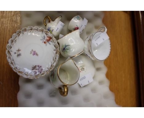 Two Royal Worcester miniature jugs, one signed J. Hassell, one signed Jones, with a Worcester dolls house jug, etc 
