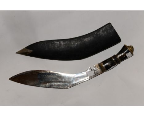 An Indian made souvenir Kukri knife with 30cm plated blade. No markings. Complete with scabbard, Both small knives are missin