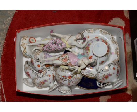 A pair of Chelsea figurines with gold anchor work to back, together with six continental cups and saucers and two German porc