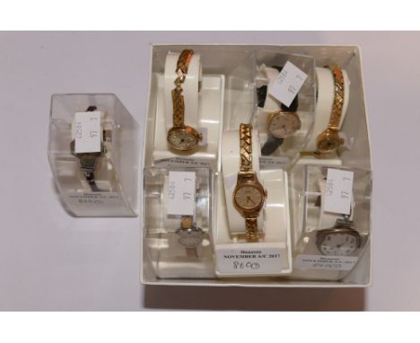 A collection of seven ladies watches, including a high carat gold Tissot, a 1930's silver watch,  and brands such as Sekonda,