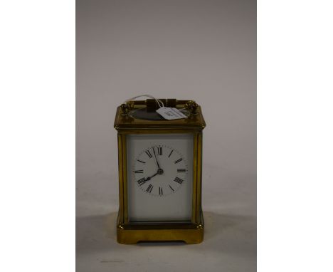 Gilt brass French carriage clock with key